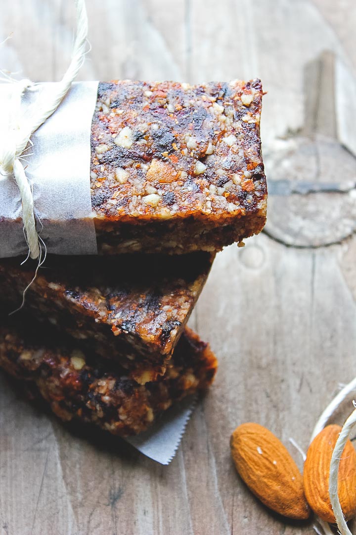 Quick and easy homemade lara bars with almonds, dates and dried cherries. Vegan, gluten free, dairy free. The perfect snack recipe!