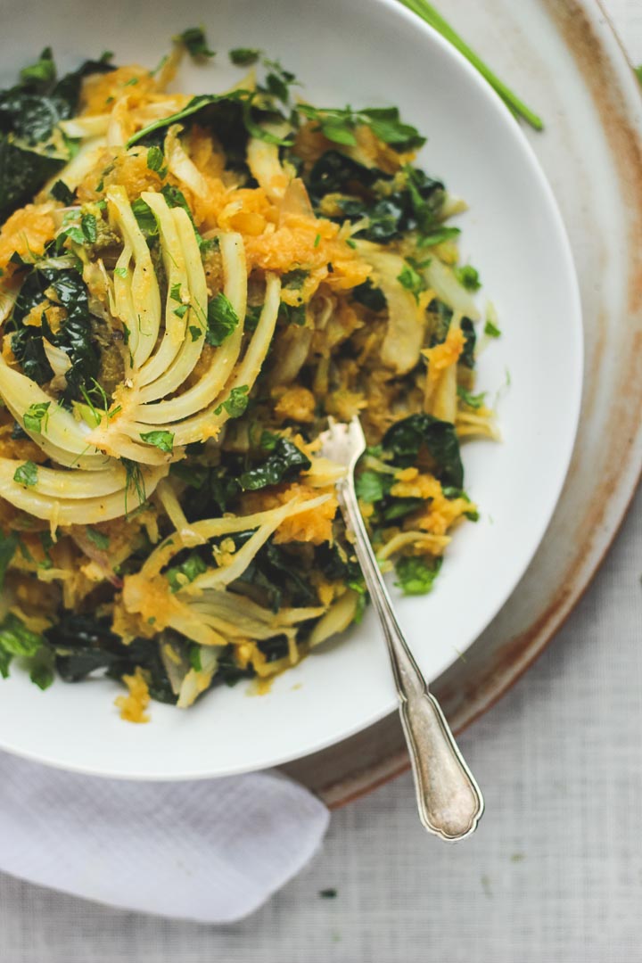 Spaghetti Squash with fresh herbs, roasted garlic, kale, fennel + shallots. Vegan + Gluten Free. Serves 2.