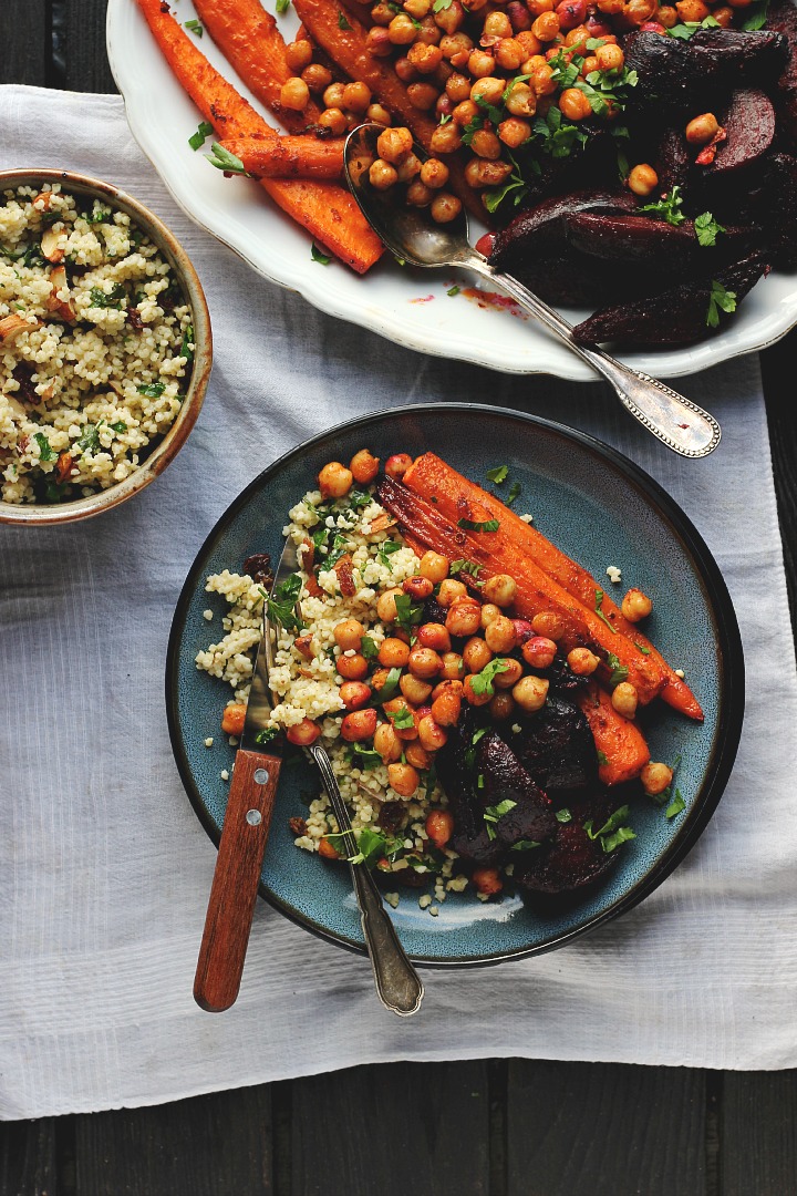Harissa roasted carrots, beets + crispy chickpeas served with a herby millet pilaf with raisins, almonds and cilantro. Vegan + gluten free. Serves 4.