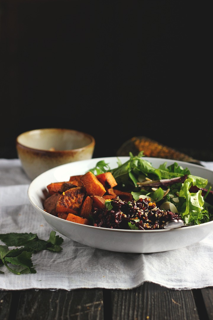 Roasted sweet potatoes with ras el hanout, cumin and chili. Fragrant black rice with orange, dates + sesame dressing. Vegan + Gluten free. Serves 4.
