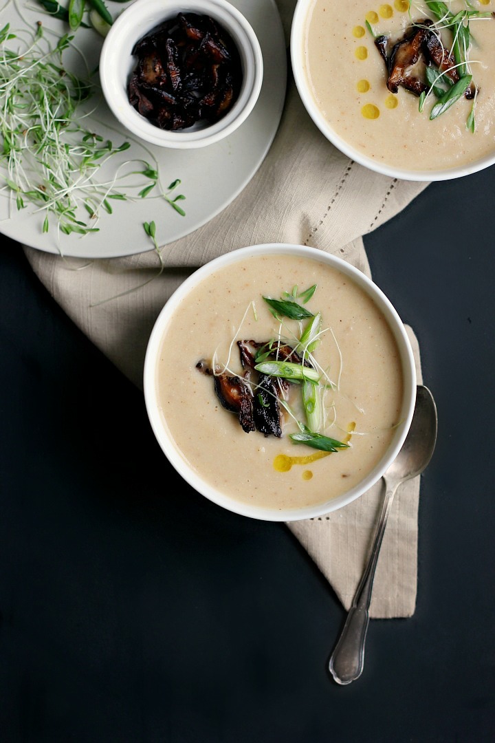 Creamy vegan roasted cauliflower soup with miso and parsnips topped with tamari roasted shitakes. Warm and earthy for those cold winter nights.
