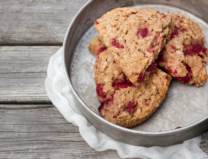 Raspberry Oat Scones made with whole grain flour and sweetened with honey. Vegan. Makes 6 scones. The perfect summer treat!