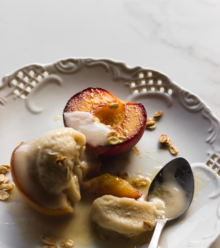 Easy, creamy vegan oat milk ice cream made with oats, vanilla and honey. Served with grilled peaches and honey toasted oats. 